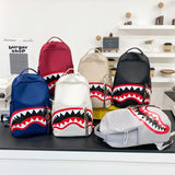 2026 New Shark Graffiti Casual Backpack for Men and Women, fashionable, trendy, sporty, large capacity (excluding pendants) (black)
