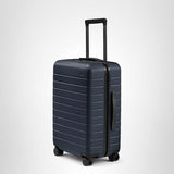 Away Bigger Carry-On Luggage, Lightweight Hardside Large Suitcase with Spinner Wheels, TSA Lock, Airline Approved, Navy Blue