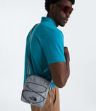 The North Face Jester Crossbody Bag - Water-Repellent Sling Bag, Multiple Carry Options, Adjustable, Bungee Support, Mid Grey Dark Heather/TNF Black, One Size