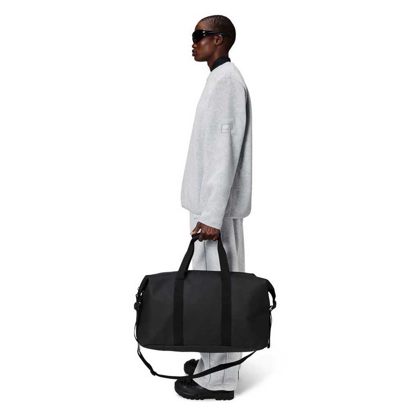 RAINS Hilo Weekend Bag - Black Waterproof Travel Duffel for Men and Women - Black Duffle with Coated Zip, Compression Straps, Adjustable Strap - 2 Year Warranty