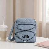 The North Face Jester Crossbody Bag - Water-Repellent Sling Bag, Multiple Carry Options, Adjustable, Bungee Support, Mid Grey Dark Heather/TNF Black, One Size