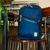 Topo Designs Commuter Backpack, Rugged and Durable Recycled Nylon Fabrics, 25L Capacity, Moulded Back Panel, External Access Laptop Sleeve (Desert Palm/Elmwood)
