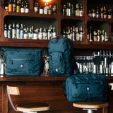 Topo Designs Global Pro Backpack, Waterproof X-Rip Fabric, Metal Hardware, External Access Laptop Sleeve, Pass Through Sleeve, Rugged + Minimalist PFC-Free (Dark Pine)