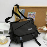 Inshere Aesthetic Crossbody Bag with Cute Pins and Ornament, Casual Shoulder Messenger Bag Japanese Kawaii Bag for Women Men (Black)