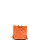 Chanel, Pre-Loved CC Pocket Chain Bucket Backpack Quilted Lambskin Small, Orange