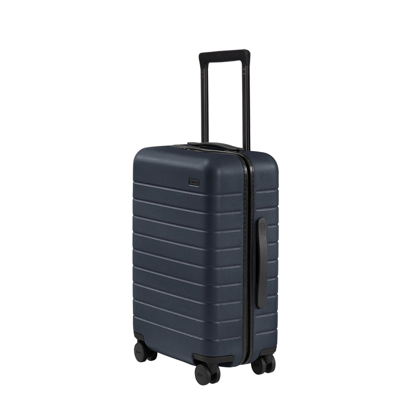 Away Bigger Carry-On Luggage, Lightweight Hardside Large Suitcase with Spinner Wheels, TSA Lock, Airline Approved, Navy Blue