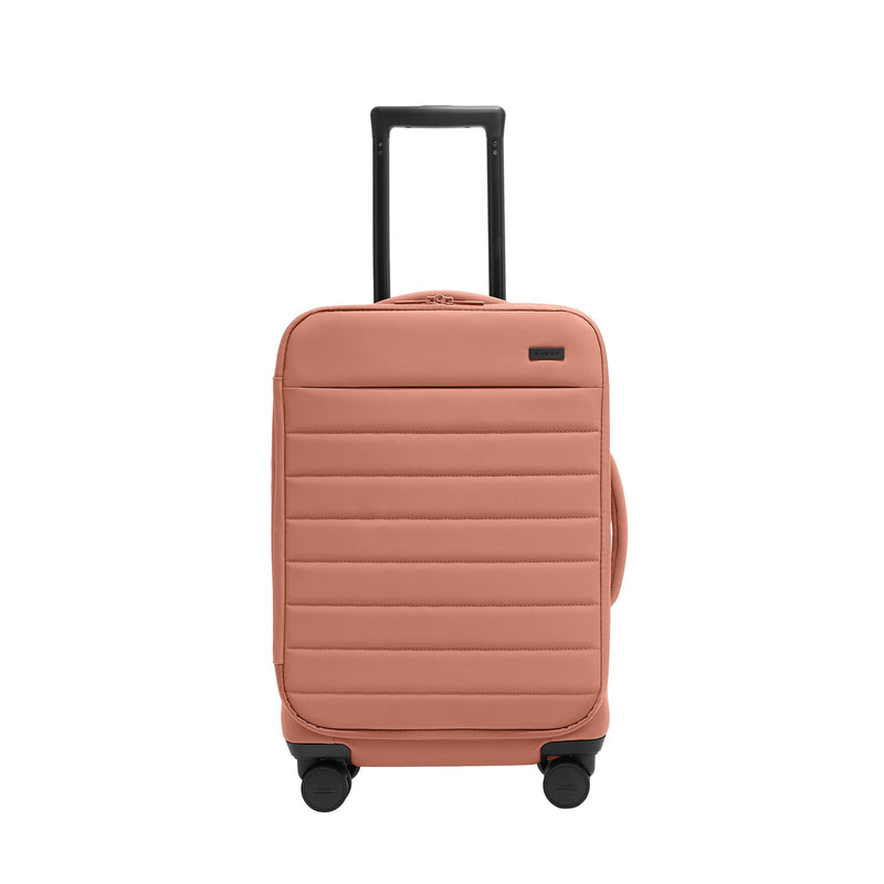 Away Softside Bigger Carry-On Suitcase, 23 Inch Expandable High-Strength Nylon Luggage With Spinner Wheels, Meets Requirements for Most Major Airlines, Clay Pink