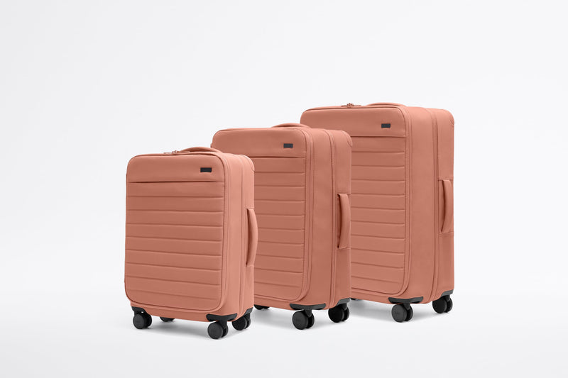 Away Softside Bigger Carry-On Suitcase, 23 Inch Expandable High-Strength Nylon Luggage With Spinner Wheels, Meets Requirements for Most Major Airlines, Clay Pink