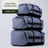Eagle Creek Cargo Hauler Wheeled Duffel - Durable Duffel Bag for Travel - Easy Access Compartment - Deployable Backpack Straps - Lockable Zipper Opening - Glacier Blue - 130L