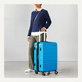 Amazon Basics 26" Hardside Medium Checked Luggage, Expandable For Up to 15% More Space, With Scratch-Resistant Surface, Four Multi-directional Wheels, Light Blue