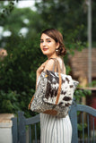 Myra Bag Oriental Flapover Backpack - 14.5x14 Cow Print Purses for Women, Black and White Canvas and Hairon, Leather Accents, Trendy Cowgirl, Everyday Western Style Women's Purses, For Work, Travel