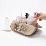 THE VERTI-Vertical Waterproof Makeup & Toiletry Bag | 23-Pocket Organizer with Upright, Fold-Down Design for Skincare, Toiletries & Essentials (Sandstone, Medium)
