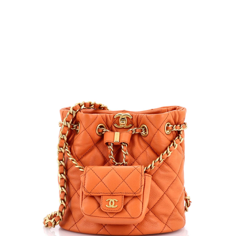 Chanel, Pre-Loved CC Pocket Chain Bucket Backpack Quilted Lambskin Small, Orange