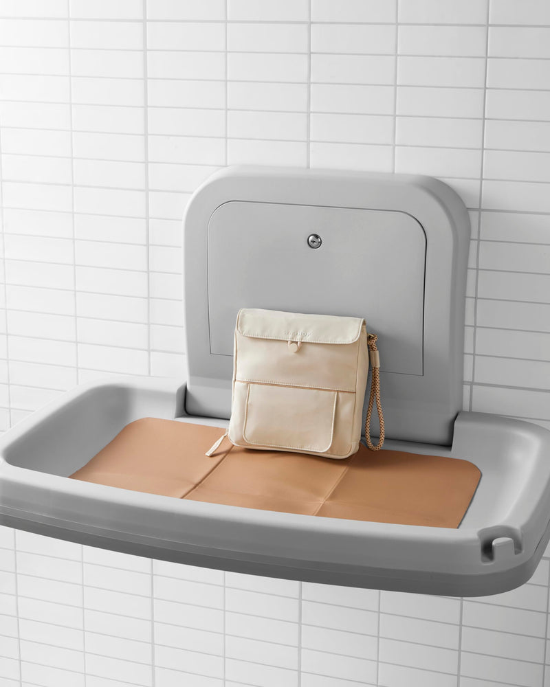 Skip Hop Travel Baby Changing Pad with Easy-Clean Surface, Covers Public Changing Stations, Wipes Pocket, Diaper Storage, Disposable Bag Dispenser and Magnetic Wipes Pocket, Clean Slate, Oat