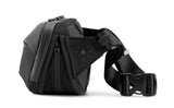 NOMATIC Navigator Sling 1L Bag - 1L w/ 2L Built-In Expansion - Slim & Lightweight Crossbody, Fanny-Pack - Water Resistant Everyday (Black)