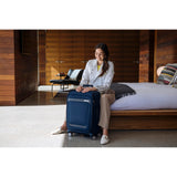 Samsonite Elevation Plus Carry-On Luggage - Airline Approved Softside Suitcase - 360 Spinner Wheels - Integrated ID Tag - Quick-Access Stash Pocket - Wet Pocket - AirTag™ Holder - Midnight Blue