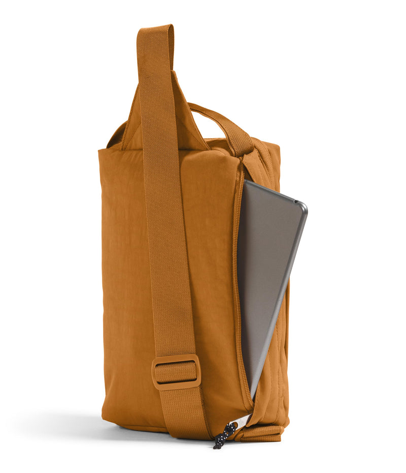 The North Face Berkeley Field Bag | Water Repellent Finish, Vintage Style Travel Essential, Sling Holds Water Bottles, Phones & Keys, Timber Tan/TNF Black, One Size