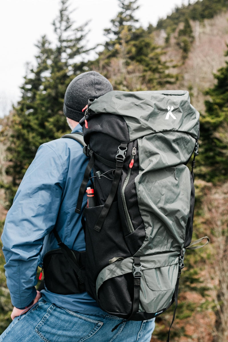 Bear Grylls 65L + 5L Hiking Hydration Backpack, Perfect For Backpacking, Large Pack With Separated Bottom Compartment, Camping, Mountain Biking, Skiing, Snowboarding, For Men and Women - Black