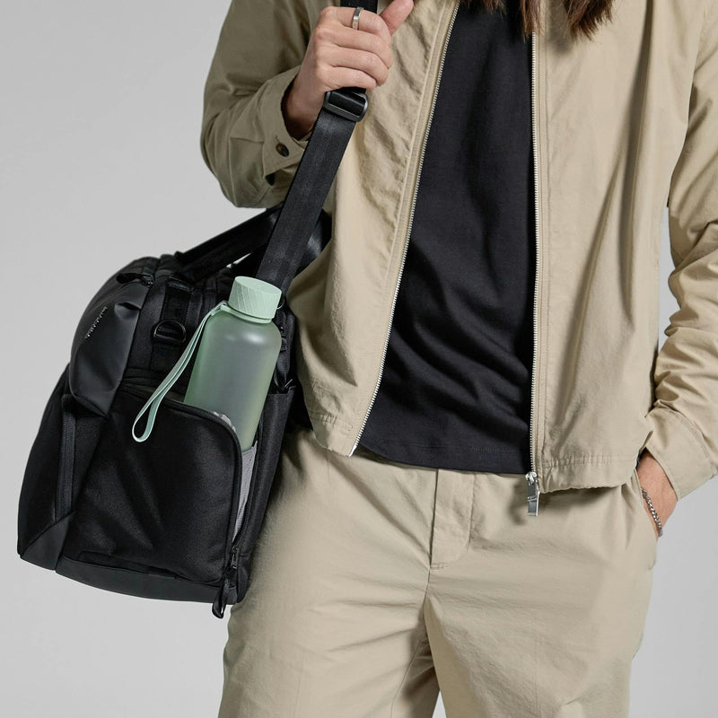 Incase A.R.C. Duffel with ReSpun 100% Recycled Polyester – 40L, Two-Way Zipper, Quick Access Pockets, 16” Laptop Storage Pocket, Travel Pass-Through, Adjustable Strap, Internal Organization, Black