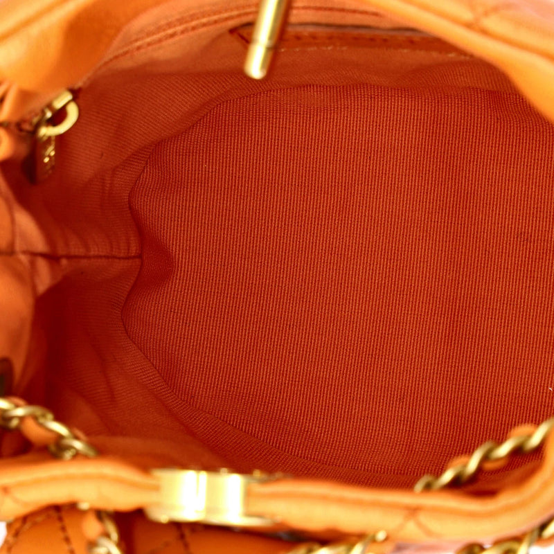 Chanel, Pre-Loved CC Pocket Chain Bucket Backpack Quilted Lambskin Small, Orange