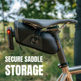 KOM Cycling Saddle Bag - Bike Saddle Bag to Carry Multi-Tool, Tube, Tire Levers, Securely Under Bike Seat featuring for Garmin Varia Mount, ATOP Lacing Dial, and Inner Pocket for Apple AirTag.