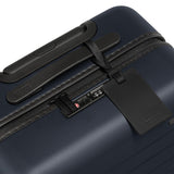 Away Bigger Carry-On Luggage, Lightweight Hardside Large Suitcase with Spinner Wheels, TSA Lock, Airline Approved, Navy Blue