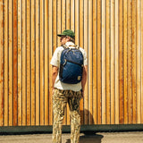 Topo Designs Commuter Backpack, Rugged and Durable Recycled Nylon Fabrics, 25L Capacity, Moulded Back Panel, External Access Laptop Sleeve, BlueSign Approved (Navy/Sahara)