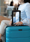 Samsonite Omni PC Hardside Expandable Luggage with Spinner Wheels, Caribbean Blue, Checked-Medium 24-Inch