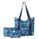 Sakroots On the Go 4 Piece Travel Bundle, Includes 21" Rolling Suitcase, Packable Large Tote, Medium & Small Pouches, Royal Blue Seascape