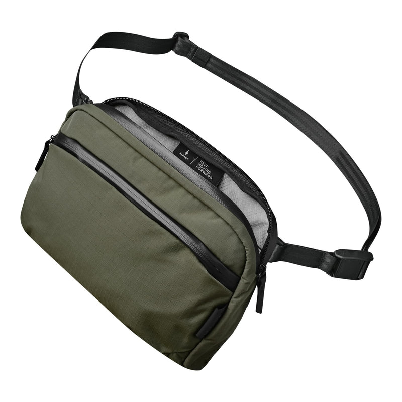 ALPAKA Flight Sling 2L - Crossbody Sling Bag For Men Travel Lightweight,Portable, Packable, with Quick Release Shoulder Strap and Magnetic Buckle - Integrated Key Leash - WeatherProof,Green Axoflux 210