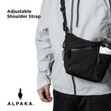 ALPAKA Flow Satchel Mini 2L - Crossbody Bag, Water Resistant Shoulder Bag, Expandable Bottle Pocket, YKK Zippers, Key Tether, Adjustable Strap, Travel Luggage Sleeve, Black Axoflux 210D Fabric