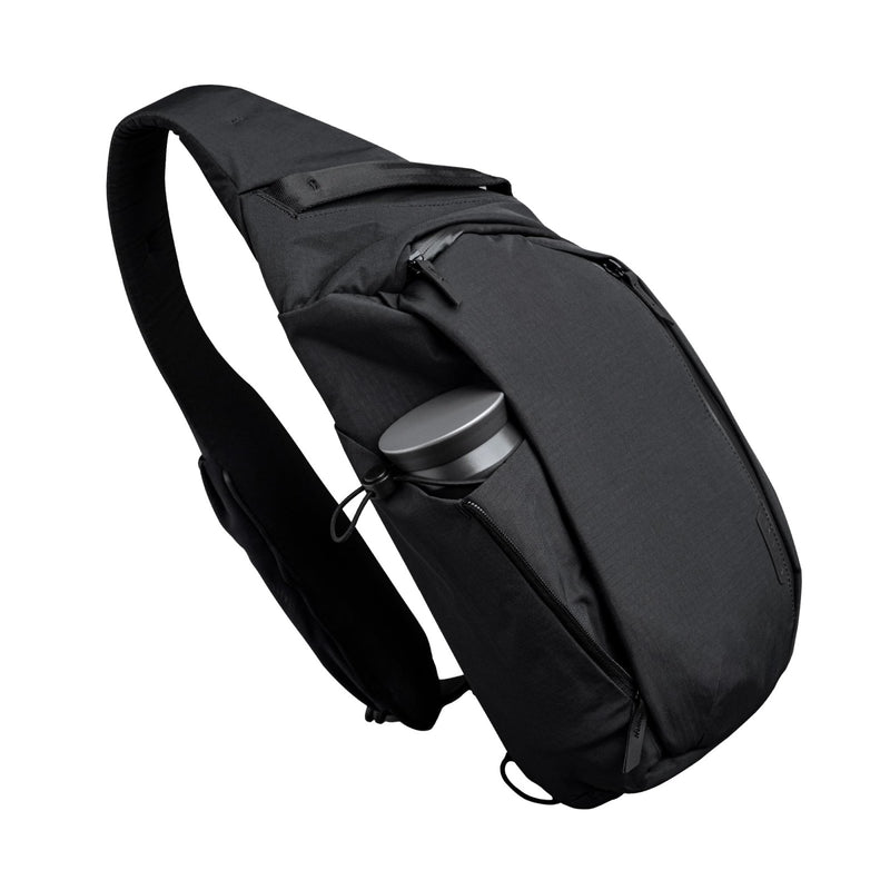 ALPAKA Metro Crossbody Left Shoulder 7.5L - Crossbody Bag Men,Sling Backpack - Fits 11" Tablet - Single Shoulder with YKK Zipper - Expandable Water Bottle Pocket - Phone Sleeve - Black Axoflux 210D