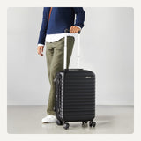 Amazon Basics 21" Hardside Carry - On Luggage with Spinner Wheels, Expandable for Up to 25% More Space, Scratch - Resistant Hard Shell, Telescoping Handle, Black