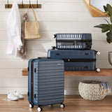 Amazon Basics 21" Hardside Carry - On Luggage with TSA Lock, Expandable, Organized Interior with Divider and Pockets, Spinner Wheels, Navy Blue