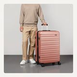 Amazon Basics 30" Hardside Large Checked Luggage, Expandable For Up to 15% More Space, Scratch-Resistant Surface, Four Multi-directional Wheels, Rose Gold
