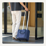 Amazon Basics Underseat Carry - On Luggage with Wheels, 14" Rolling Travel Bag, Fits Under the Seat with Multiple Pockets and Compartments, Navy Quilted