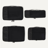 Amazon Essentials 4 - Piece Space - Saving Packing Cubes Travel Accessories Set, Luggage Organizer with Double Zipper, Mesh Top, Small/Medium/Large/Slim, Black (Previously Amazon Basics)