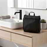 Amazon Essentials Waterproof Travel Toiletry Bag for Men and Women, Hanging Dopp Kit with Multiple Interior Pockets, 2 Side Pockets, Black, 10" x 4" x 10"
