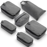 Compression Packing Cubes for Travel by TRIPPED – 6 - Piece Premium Set with Laundry & Shoe Bag, Space Saving Travel Organizer Bags for Suitcase & Carry - On Luggage (Grey)