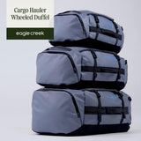 Eagle Creek Cargo Hauler Wheeled Duffel - Durable Duffel Bag for Travel - Easy Access Compartment - Deployable Backpack Straps - Lockable Zipper Opening - Iron Orange - 130L