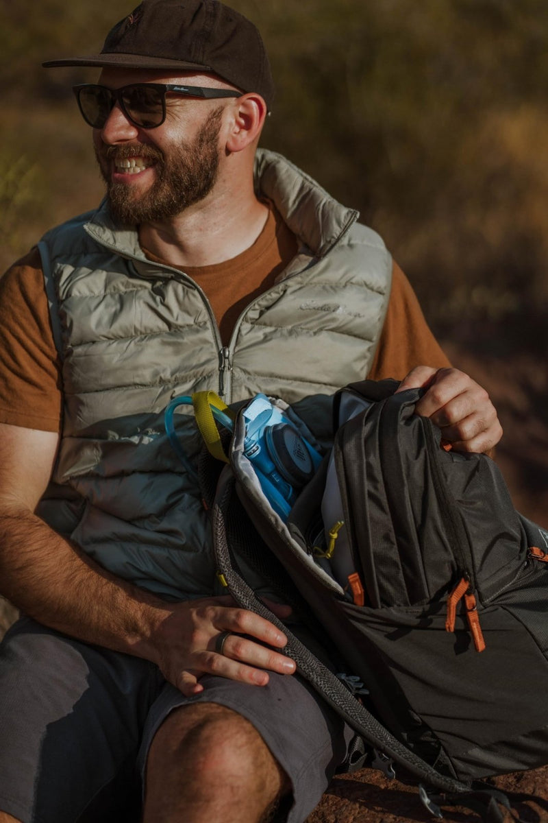 Eddie Bauer 22L Nomad Daypack, Hydration and Laptop Compatible, Dusted Indigo