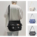 Fashion Crossbody Bag with Cute Accessories Nylon Casual Messenger Bag with Pendant Lightweight Handbag Travel Daypacks (Black)