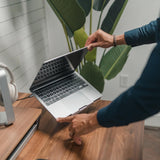 HumanCentric Laptop Riser for Desk in Black Walnut Wood Top and Space Gray Aluminum Base, Compatible with MacBook and Other Laptops Up to 16 Inches, Ergonomic Computer Holder, 25 - Degree Angle Tilt