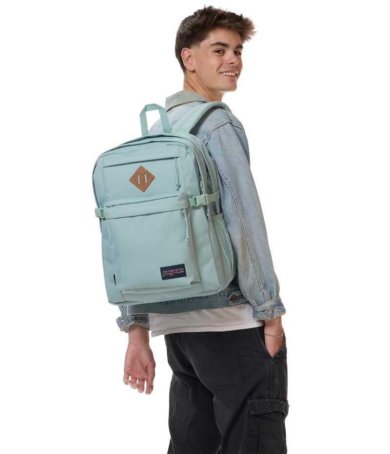 JanSport Main Campus Backpack - Travel or Work Backpack with 15 - Inch Laptop Sleeve and Dual Water Bottle Pockets, Faded Sage