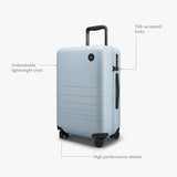 Monos Carry-On Luggage 22 Inch – Lightweight Hardside Spinner Suitcase with TSA Lock | Airline Approved, 39.9L Polycarbonate Rolling Carry On Bag | Overhead Bin Suitcase for Travel | Blue Haze