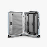 Monos Carry-On Luggage 22 Inch – Lightweight Hardside Spinner Suitcase with TSA Lock | Airline Approved, 39.9L Polycarbonate Rolling Carry On Bag | Overhead Bin Suitcase for Travel | Blue Haze