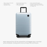 Monos Carry-On Luggage 22 Inch – Lightweight Hardside Spinner Suitcase with TSA Lock | Airline Approved, 39.9L Polycarbonate Rolling Carry On Bag | Overhead Bin Suitcase for Travel | Blue Haze