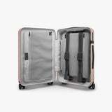 Monos Carry-On Luggage 22 Inch – Lightweight Hardside Spinner Suitcase with TSA Lock | Airline Approved, 39.9L Polycarbonate Rolling Carry On Bag | Overhead Bin Suitcase for Travel | Rose Quartz