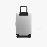 Monos Carry - On Luggage (22"), Lightweight Hardside Spinner Suitcase with TSA Lock, Airline Approved, Stellar White