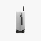 Monos Carry - On Luggage (22"), Lightweight Hardside Spinner Suitcase with TSA Lock, Airline Approved, Stellar White